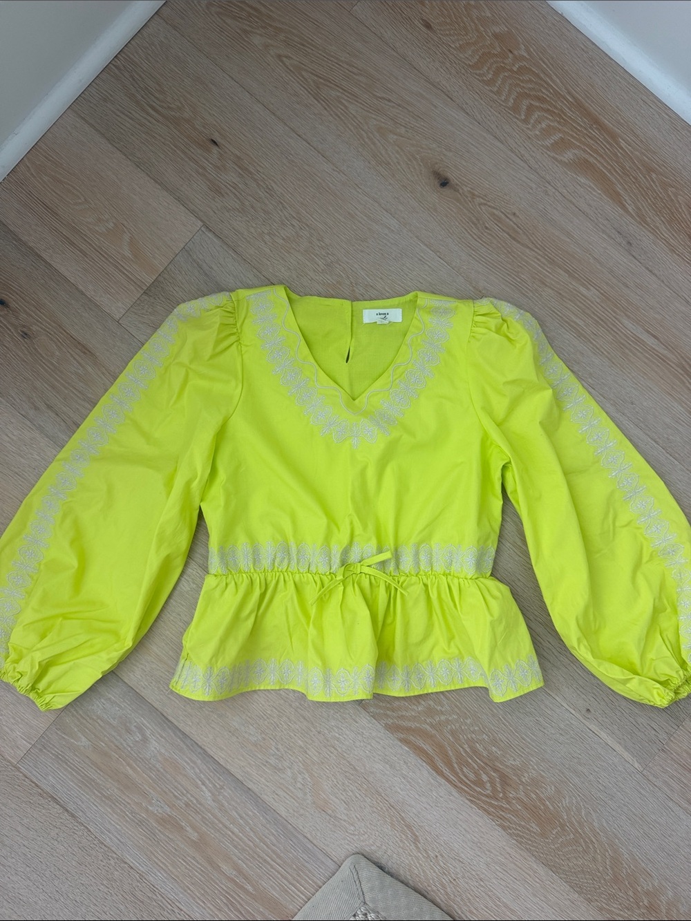Girls' Neon Yellow V-Neck Peplum Top with Embroidered Trim